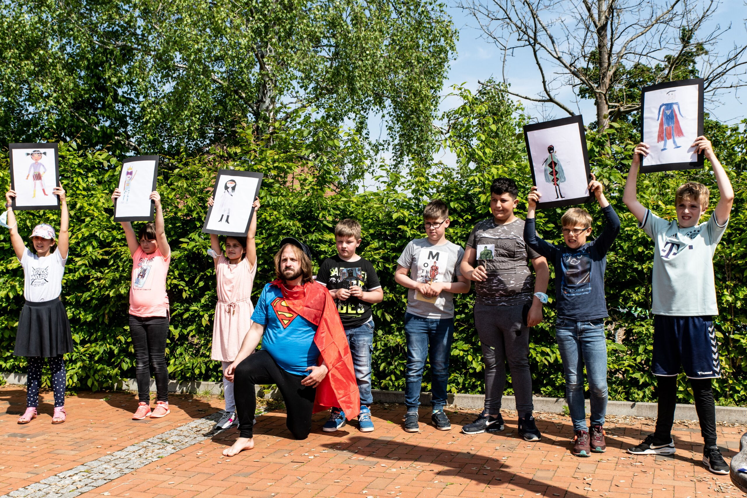 Kinder als Superheld*innen